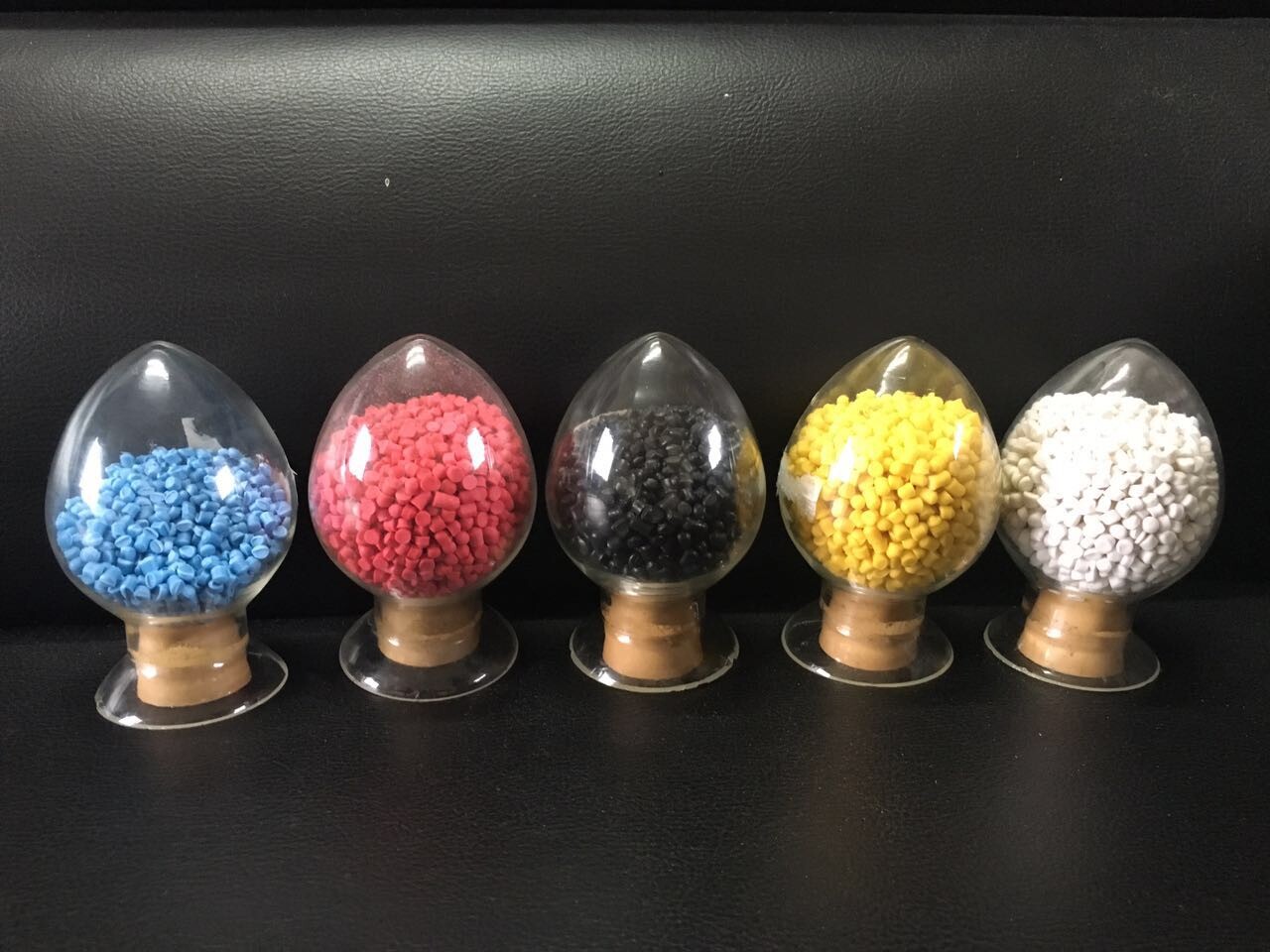 multi color pvc pellets in glass bottles