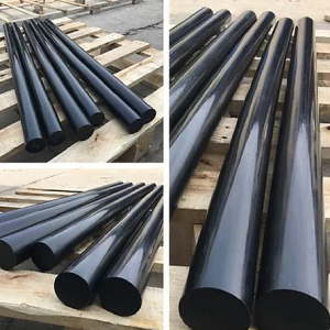 black solid plastic rods pp pa pom finished products stacked on wooden pallets